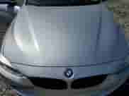 2015 BMW 4 Series 428i z VIN WBA4A5C50FG051756, wystawiony jako Copart lot #56155155 z przebiegiem 120 009 mil mil oraz Szkoda całkowita • Salvage title. Historia ofert i sprzedaży dostępna na DreamBid. Obrazek 11.