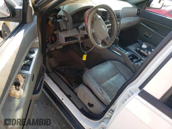 2006 Jeep Grand Cherokee с VIN 1J8HS48N36C215344, выставлен на аукционе Copart как лот 75106574 с пробегом Не указан миль и На запчасти • Non repairable. История ставок и продаж доступна на DreamBid. Изображение 8.