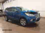 2017 Ford Escape Titanium with VIN 1FMCU9J94HUB66556, listed as a IAAI auction lot 42620675 with 125,051 mi miles and . Bid and sale history available at DreamBid. Image 1.