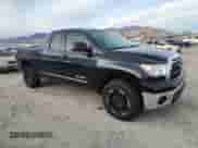 2010 Toyota Tundra with VIN 5TFUM5F15AX011202, listed as a Copart auction lot 82741795 with 181,867 mi miles and Clean title. Bid and sale history available at DreamBid. Image 4.