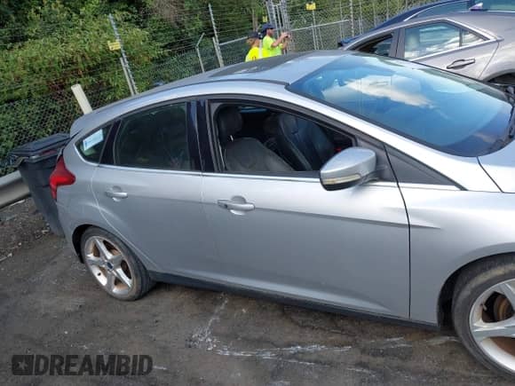 2012 Ford Focus Titanium with VIN 1FAHP3N22CL462501, listed as a IAAI auction lot 42837872 with Not provided miles and . Bid and sale history available at DreamBid. Image 13.