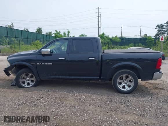 2011 Ram 1500 Big Horn with VIN 1D7RV1CT7BS582972, listed as a IAAI auction lot 42489818 with 176,420 mi miles and . Bid and sale history available at DreamBid. Image 14.