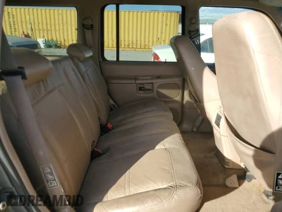 2000 Ford Explorer Eddie Bauer with VIN 1FMDU74E2YZB30465, listed as a Copart auction lot 87244384 with 166,225 mi miles and Salvage title. Bid and sale history available at DreamBid. Image 11.