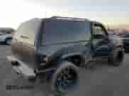 1999 Chevrolet Tahoe с VIN 3GNEC18R1XG143882, выставлен на аукционе Copart как лот 42177005 с пробегом 130 368 миль миль и Списание • Salvage title. История ставок и продаж доступна на DreamBid. Изображение 3.