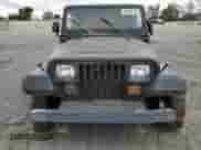 1993 Jeep Wrangler S z VIN 1J4FY19P3PP235044, wystawiony jako Copart lot #50286735 z przebiegiem 203 257 mil mil oraz Szkoda całkowita • Salvage title. Historia ofert i sprzedaży dostępna na DreamBid. Obrazek 5.