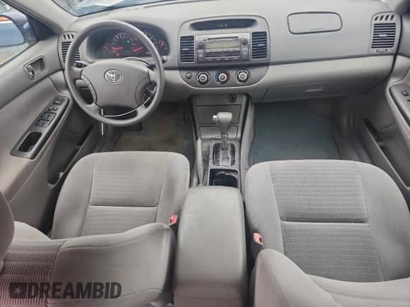 2005 Toyota Camry LE с VIN 4T1BE32K15U401465, выставлен на аукционе Copart как лот 84410985 с пробегом 124 241 миль миль и Списание • Salvage title. История ставок и продаж доступна на DreamBid. Изображение 8.
