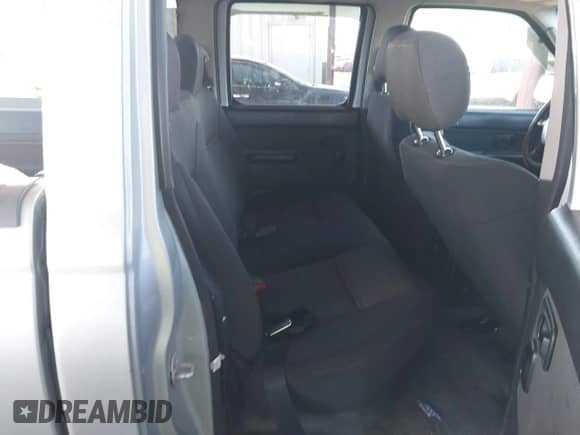 2003 Nissan Frontier SVE with VIN 1N6MD29Y63C465571, listed as a IAAI auction lot 41502613 with 175,996 mi miles and . Bid and sale history available at DreamBid. Image 8.