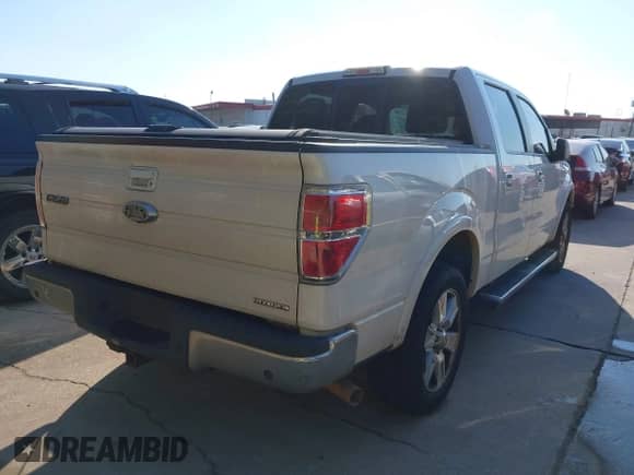 2013 Ford F-150 XLT with VIN 1FTFW1CF9DFA90749, listed as a IAAI auction lot 43477173 with 199,054 mi miles and . Bid and sale history available at DreamBid. Image 4.