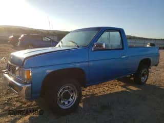 1995 Nissan Frontier z VIN 1N6SD11S5SC418152, wystawiony jako Copart lot #71164695 z przebiegiem 133 488 mil mil oraz Szkoda całkowita • Salvage title. Historia ofert i sprzedaży dostępna na DreamBid. Obrazek 1.