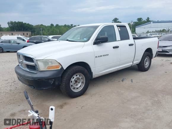 2011 Ram 1500 ST with VIN 1D7RB1GK9BS703429, listed as a IAAI auction lot 42820102 with 202,957 mi miles and . Bid and sale history available at DreamBid. Image 17.