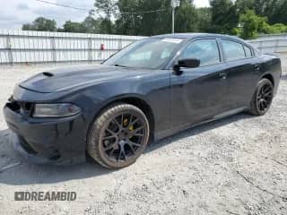 2021 Dodge Charger R/T with VIN 2C3CDXCTXMH632798, listed as a Copart auction lot 69638915 with 99,019 mi miles and Salvage title. Bid and sale history available at DreamBid. Image 1.