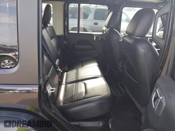 2023 Jeep Wrangler Sahara with VIN 1C4JJXP62PW628735, listed as a IAAI auction lot 42683940 with 46,534 mi miles and . Bid and sale history available at DreamBid. Image 8.