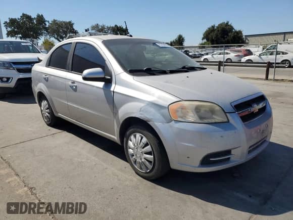 2009 Chevrolet Aveo 1LT with VIN KL1TD56E19B377365, listed as a Copart auction lot 81434555 with 103,080 mi miles and Salvage title. Bid and sale history available at DreamBid. Image 4.