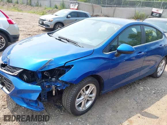 2018 Chevrolet Cruze LT z VIN 3G1BE6SM6JS588387, wystawiony jako IAAI lot #42875402 z przebiegiem 117 993 mil mil oraz . Historia ofert i sprzedaży dostępna na DreamBid. Obrazek 17.