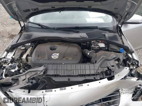 2015 Volvo S60 T5 Drive-E Premier z VIN YV126MFK4F1343110, wystawiony jako IAAI lot #43292498 z przebiegiem 59 841 mil mil oraz . Historia ofert i sprzedaży dostępna na DreamBid. Obrazek 10.