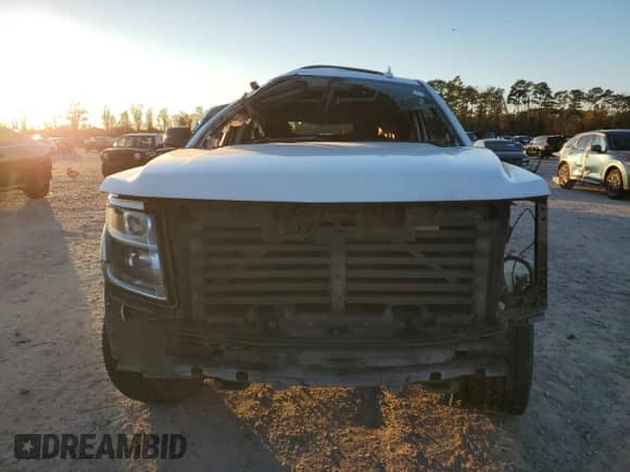 2020 Chevrolet Suburban LT z VIN 1GNSCHKC2LR220477, wystawiony jako Copart lot #71464335 z przebiegiem Nie podano mil oraz Szkoda całkowita • Salvage title. Historia ofert i sprzedaży dostępna na DreamBid. Obrazek 5.