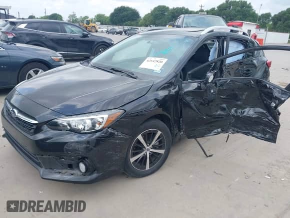 2021 Subaru Impreza Premium with VIN 4S3GTAD64M3707682, listed as a IAAI auction lot 42142820 with 44,819 mi miles and . Bid and sale history available at DreamBid. Image 2.