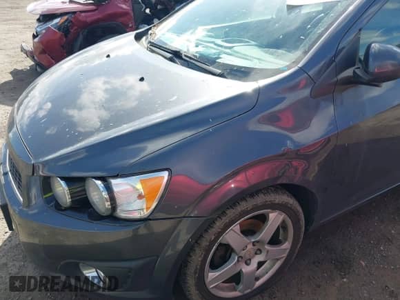 2013 Chevrolet Sonic LTZ with VIN 1G1JE6SB1D4129735, listed as a IAAI auction lot 41739740 with 116,049 mi miles and . Bid and sale history available at DreamBid. Image 6.