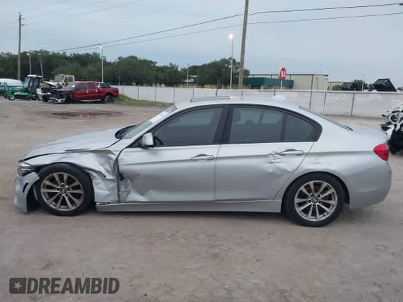 2018 BMW 3 Series 320i with VIN WBA8A9C51JAH12024, listed as a IAAI auction lot 43198146 with 98,143 mi miles and . Bid and sale history available at DreamBid. Image 14.