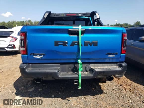 2023 Ram 1500 Rebel with VIN 1C6SRFLT5PN590742, listed as a Copart auction lot 68480204 with Not provided miles and Salvage title. Bid and sale history available at DreamBid. Image 6.