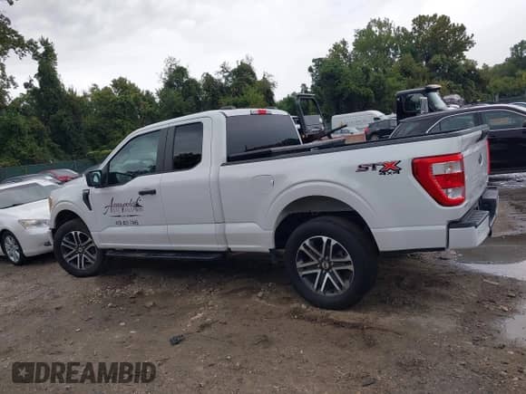 2021 Ford F-150 XL z VIN 1FTEX1EP5MFC70020, wystawiony jako IAAI lot #43237072 z przebiegiem Nie podano mil oraz . Historia ofert i sprzedaży dostępna na DreamBid. Obrazek 13.