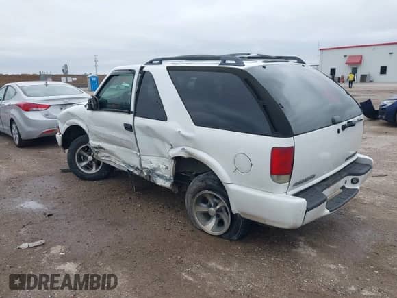 2002 Chevrolet Blazer LS с VIN 1GNCS18W42K105497, выставлен на аукционе IAAI как лот 41572072 с пробегом 142 486 миль миль и . История ставок и продаж доступна на DreamBid. Изображение 3.