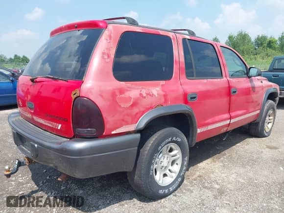 2002 Dodge Durango Sport with VIN 1B4HS38N62F154062, listed as a IAAI auction lot 42716302 with 151,616 mi miles and . Bid and sale history available at DreamBid. Image 4.