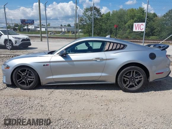 2023 Ford Mustang EcoBoost with VIN 1FA6P8TH8P5104941, listed as a IAAI auction lot 43214980 with 66,194 mi miles and . Bid and sale history available at DreamBid. Image 14.