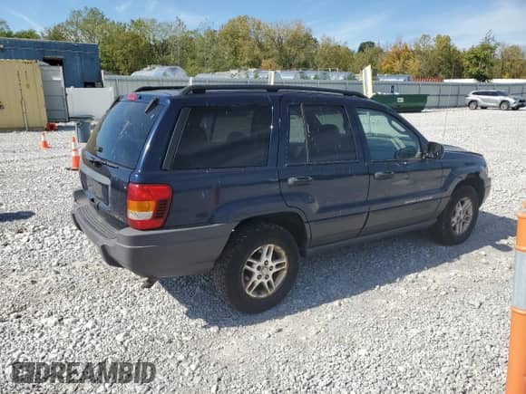 2004 Jeep Grand Cherokee Laredo with VIN 1J4GX48S14C220124, listed as a Copart auction lot 84979245 with 237,797 mi miles and Salvage title. Bid and sale history available at DreamBid. Image 3.