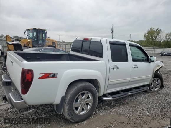 2011 Chevrolet Colorado 2LT с VIN 1GCHSDFEXB8111764, выставлен на аукционе Copart как лот 71068774 с пробегом 184 347 миль миль и Списание • Salvage title. История ставок и продаж доступна на DreamBid. Изображение 3.