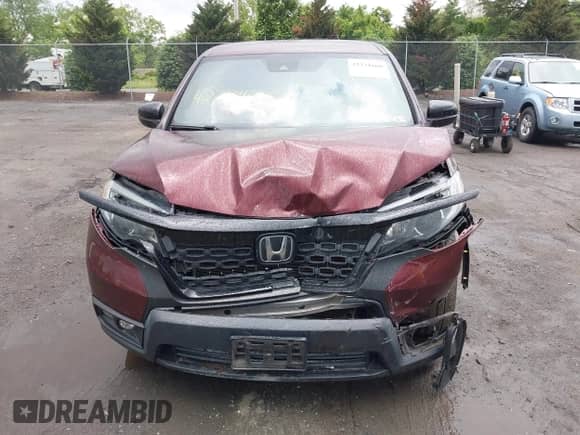 2019 Honda Passport Sport with VIN 5FNYF8H21KB010014, listed as a IAAI auction lot 42334660 with 76,548 mi miles and . Bid and sale history available at DreamBid. Image 12.