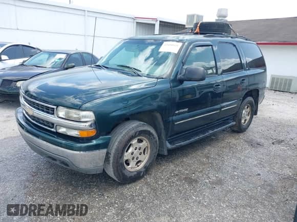 2001 Chevrolet Tahoe LS with VIN 1GNEC13T11J249287, listed as a IAAI auction lot 42410921 with 424,943 mi miles and . Bid and sale history available at DreamBid. Image 2.