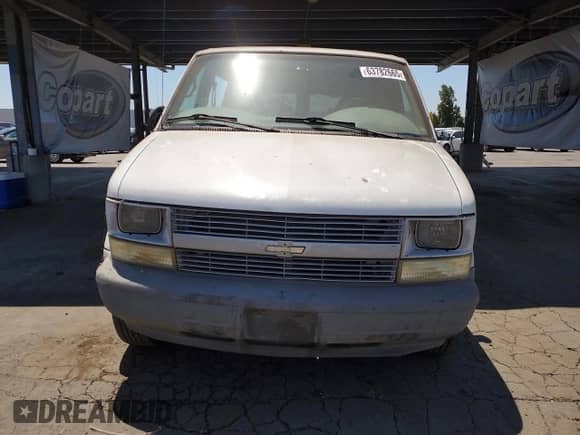 2002 Chevrolet Astro Cargo z VIN 1GCDM19X72B155387, wystawiony jako Copart lot #63782665 z przebiegiem 267 195 mil mil oraz Szkoda całkowita • Salvage title. Historia ofert i sprzedaży dostępna na DreamBid. Obrazek 5.