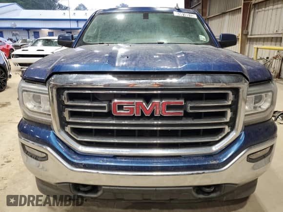 2017 GMC Sierra 1500 SLE z VIN 1GTV2MEC4HZ193075, wystawiony jako Copart lot #69818515 z przebiegiem 169 360 mil mil oraz Czysty tytuł • Clean title. Historia ofert i sprzedaży dostępna na DreamBid. Obrazek 5.