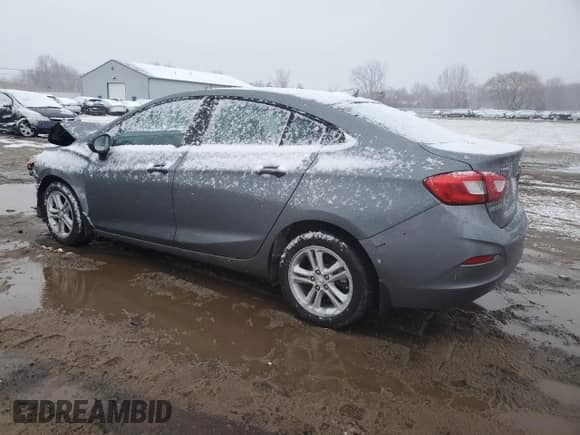 2018 Chevrolet Cruze LT z VIN 1G1BH5SEXJ7140761, wystawiony jako Copart lot #81169113 z przebiegiem 100 784 mil mil oraz . Historia ofert i sprzedaży dostępna na DreamBid. Obrazek 2.