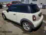 2013 MINI Hardtop with VIN WMWSU3C52DT680782, listed as a Copart auction lot 61779515 with 94,378 mi miles and Salvage title. Bid and sale history available at DreamBid. Image 2.
