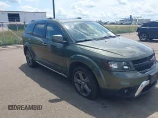 2017 Dodge Journey Crossroad Plus with VIN 3C4PDDGG8HT696084, listed as a IAAI auction lot 42822588 with 73,368 mi miles and . Bid and sale history available at DreamBid. Image 1.