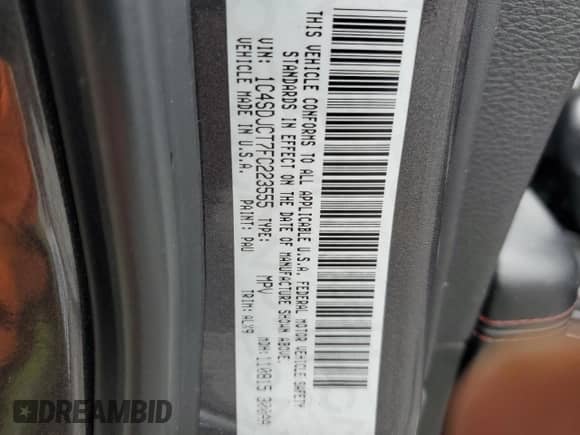 2015 Dodge Durango R/T with VIN 1C4SDJCT7FC223555, listed as a Copart auction lot 67484325 with 142,596 mi miles and Salvage title. Bid and sale history available at DreamBid. Image 13.