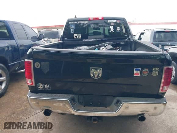 2014 Ram 1500 Laramie z VIN 1C6RR7NM7ES353887, wystawiony jako IAAI lot #42349659 z przebiegiem 206 055 mil mil oraz . Historia ofert i sprzedaży dostępna na DreamBid. Obrazek 17.