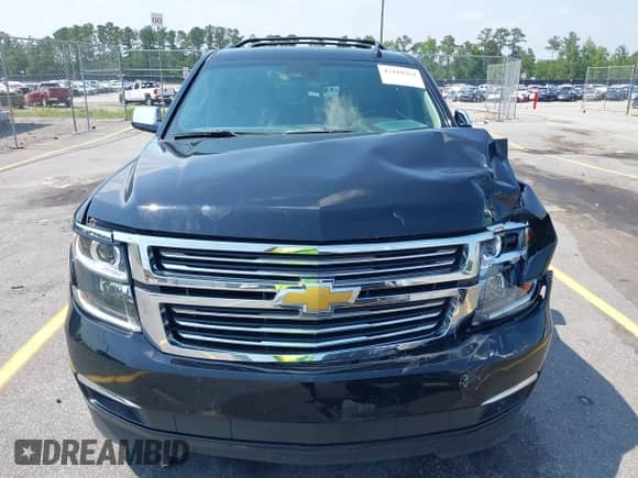 2019 Chevrolet Suburban Premier with VIN 1GNSCJKC5KR304766, listed as a IAAI auction lot 42410264 with 105,171 mi miles and . Bid and sale history available at DreamBid. Image 12.