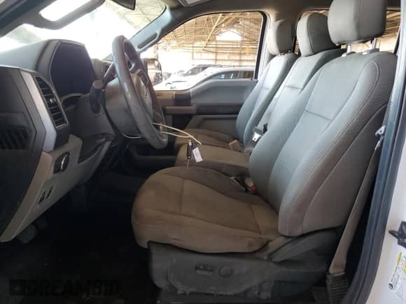 2020 Ford F-150 XL with VIN 1FTEW1C45LKD11814, listed as a Copart auction lot 69002595 with 106,500 mi miles and Salvage title. Bid and sale history available at DreamBid. Image 7.