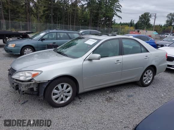 2003 Toyota Camry LE with VIN 4T1BE32K53U786106, listed as a IAAI auction lot 43214509 with 160,136 mi miles and . Bid and sale history available at DreamBid. Image 15.