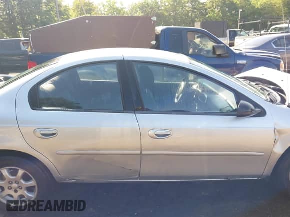 2004 Dodge Neon SXT with VIN 1B3ES56C14D543467, listed as a IAAI auction lot 42522440 with 85,180 mi miles and . Bid and sale history available at DreamBid. Image 13.