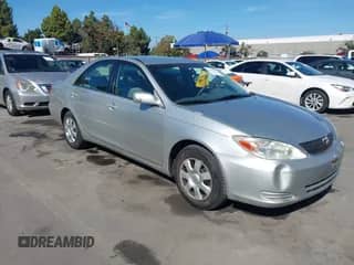 2003 Toyota Camry XLE with VIN 4T1BE32K53U650767, listed as a IAAI auction lot 43473462 with 200,316 mi miles and . Bid and sale history available at DreamBid. Image 1.