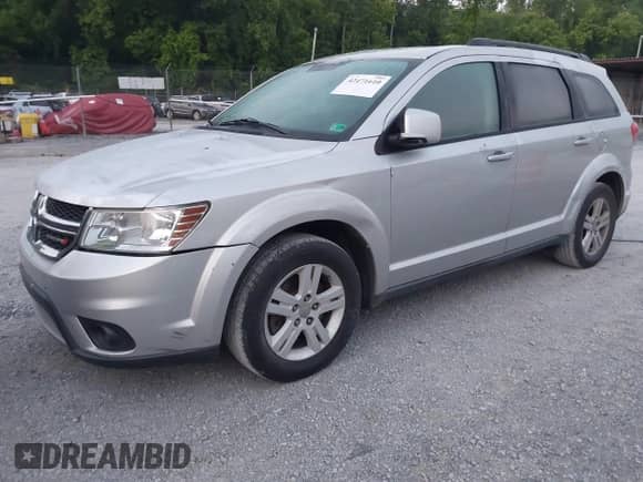 2012 Dodge Journey SXT with VIN 3C4PDCBBXCT323532, listed as a IAAI auction lot 42471610 with 188,103 mi miles and . Bid and sale history available at DreamBid. Image 2.