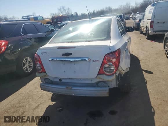 2014 Chevrolet Sonic LTZ with VIN 1G1JE5SB7E4202652, listed as a Copart auction lot 48540805 with 128,328 mi miles and Salvage title. Bid and sale history available at DreamBid. Image 6.