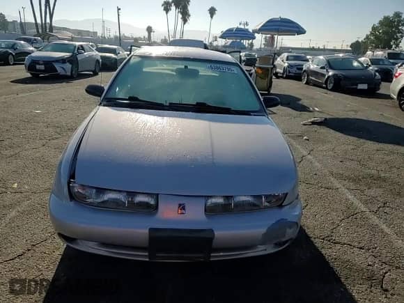 1999 Saturn SL with VIN 1G8ZK5274XZ367394, listed as a Copart auction lot 63863795 with 73,197 mi miles and Salvage title. Bid and sale history available at DreamBid. Image 13.