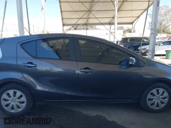 2014 Toyota Prius One z VIN JTDKDTB30E1565789, wystawiony jako IAAI lot #42873936 z przebiegiem 120 142 mil mil oraz . Historia ofert i sprzedaży dostępna na DreamBid. Obrazek 13.