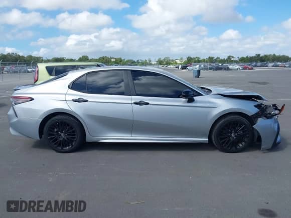 2021 Toyota Camry SE with VIN 4T1G11AK2MU445593, listed as a IAAI auction lot 43385464 with 57,907 mi miles and . Bid and sale history available at DreamBid. Image 13.