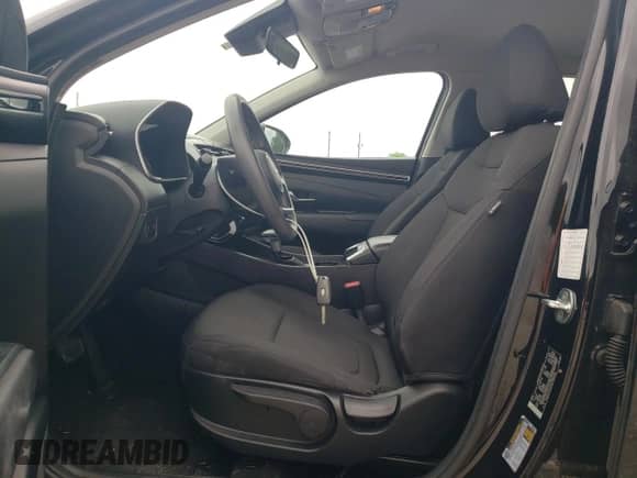 2023 Hyundai Tucson SE with VIN 5NMJA3AEXPH188906, listed as a Copart auction lot 59092635 with 59,172 mi miles and Salvage title. Bid and sale history available at DreamBid. Image 7.